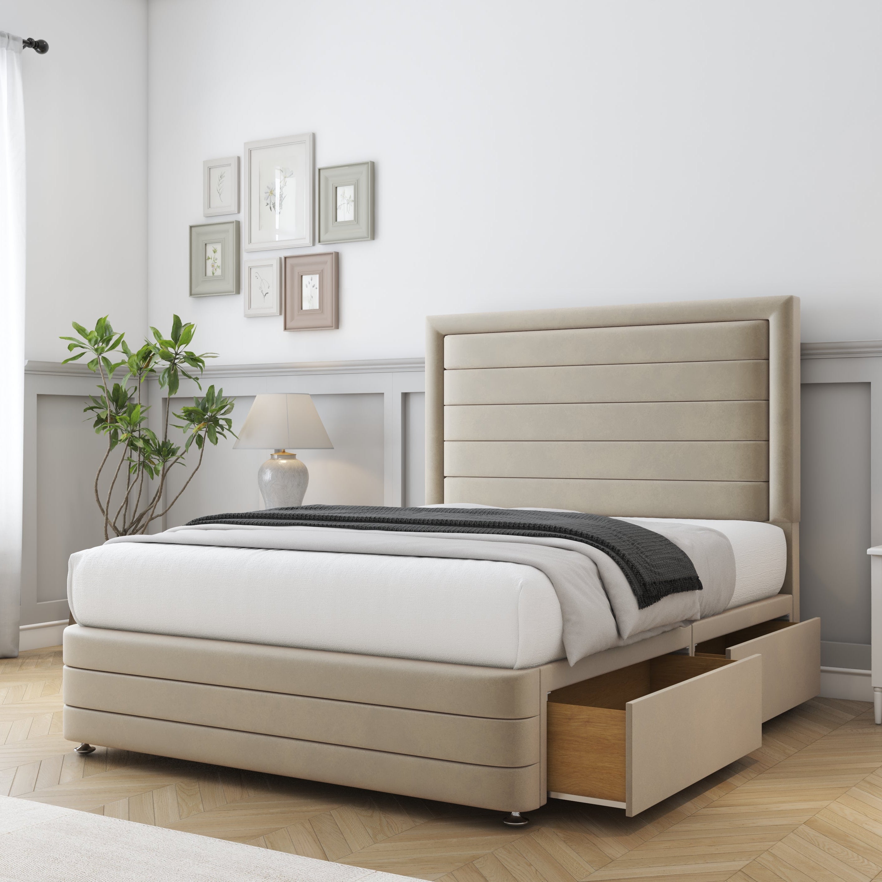 Beige upholstered bed with storage drawers in a bedroom setting.