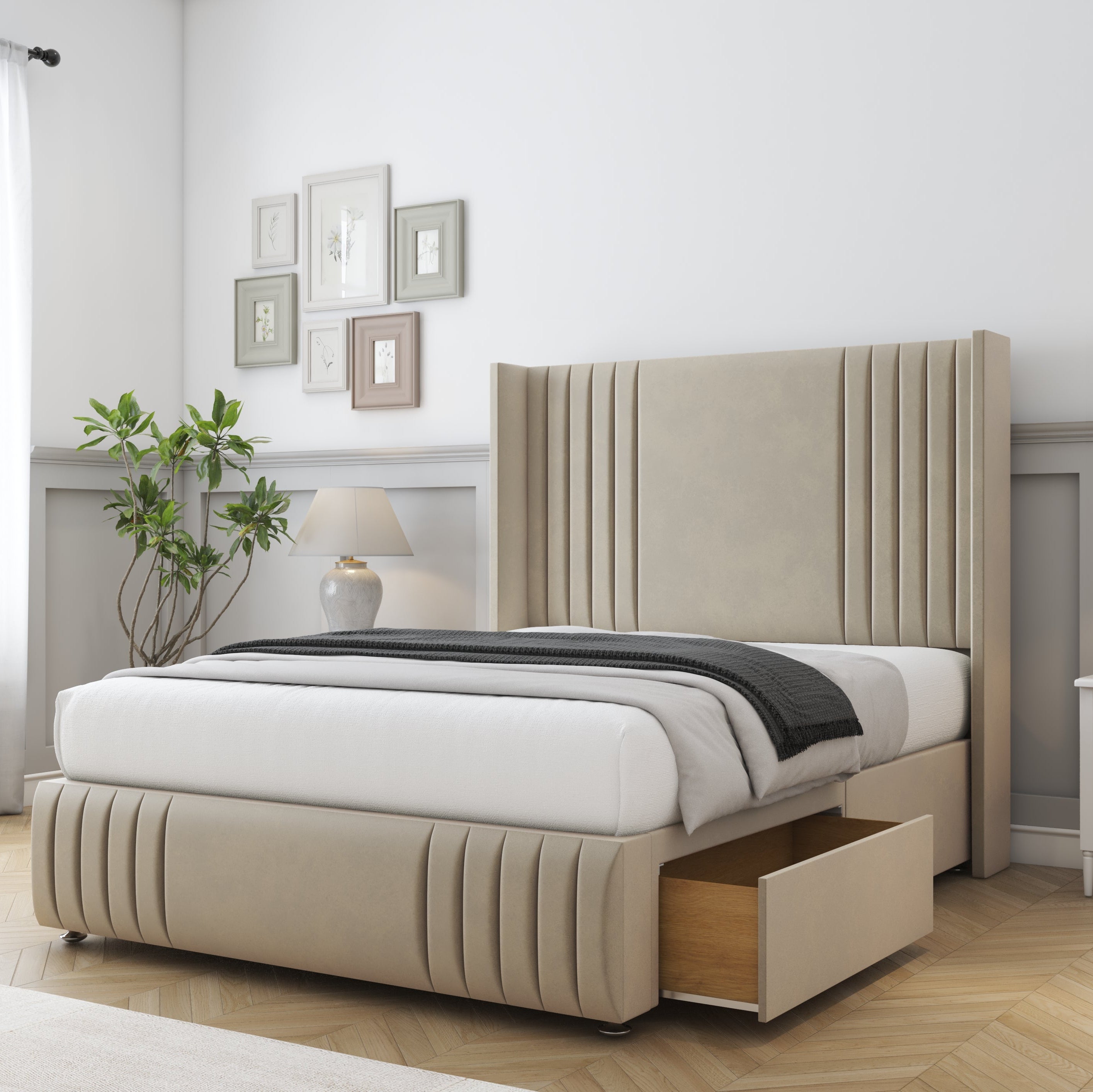 Beige upholstered bed with storage drawers in a bedroom setting.