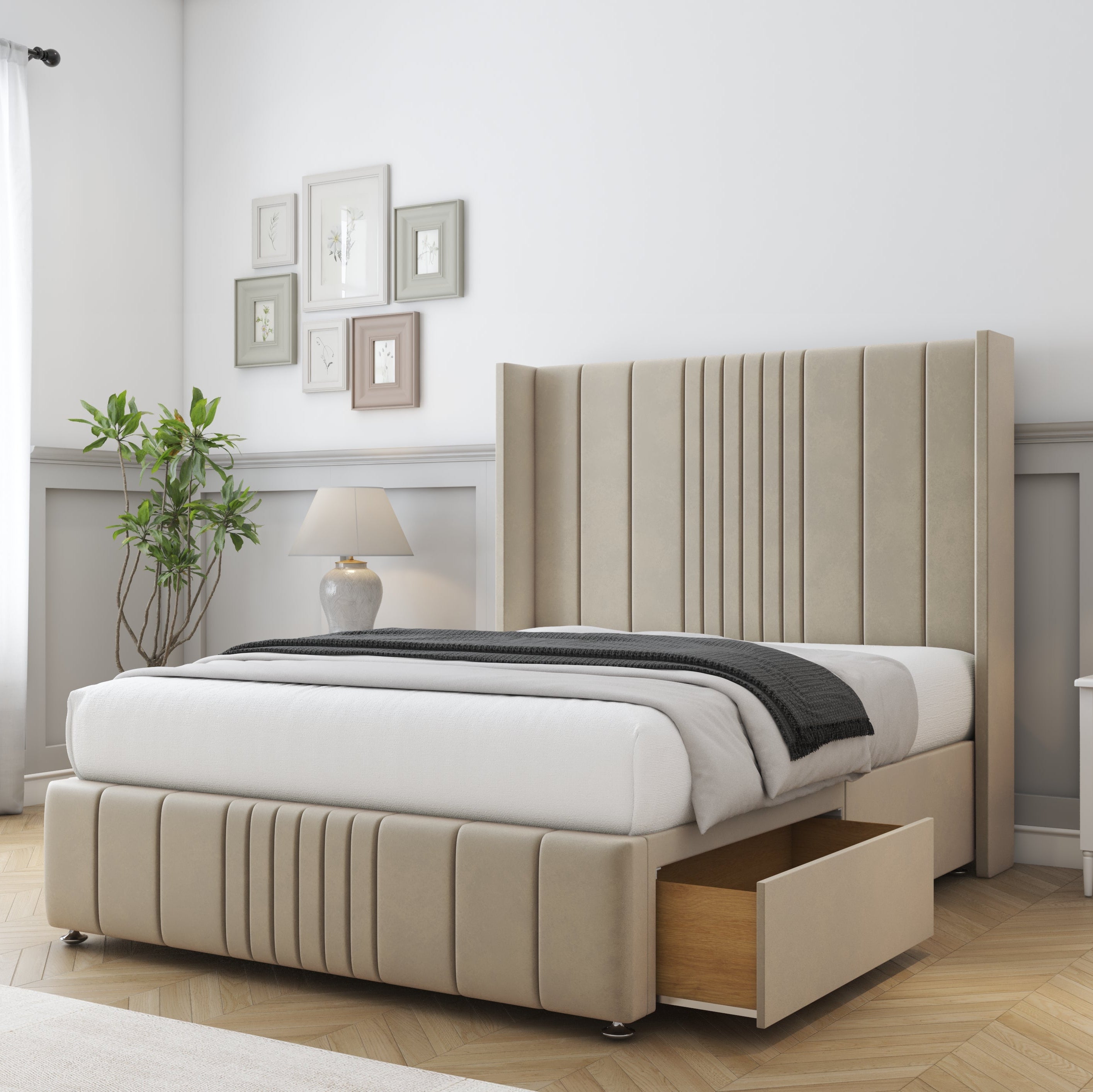 Beige upholstered bed with storage drawers in a bedroom setting.